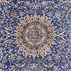 Central Persian Nain hand-knotted rug, soft blue field with central medallion with finely drawn scrolling palmettes and floral tendrils, with ivory spandrels, enclosed by a floral meander border flanked by multiple guard stripes with cotton fringe ends 