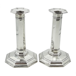 Pair of silver candlesticks octagonal design by Hawksworth, Eyre & Co Ltd Sheffield 1913 16.3cm, weighted bases  