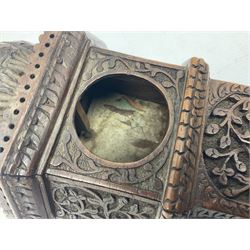 Carved wooden pocket watch holder/stand, in the form of a clock tower, with carved floral design and domed top, H36cm