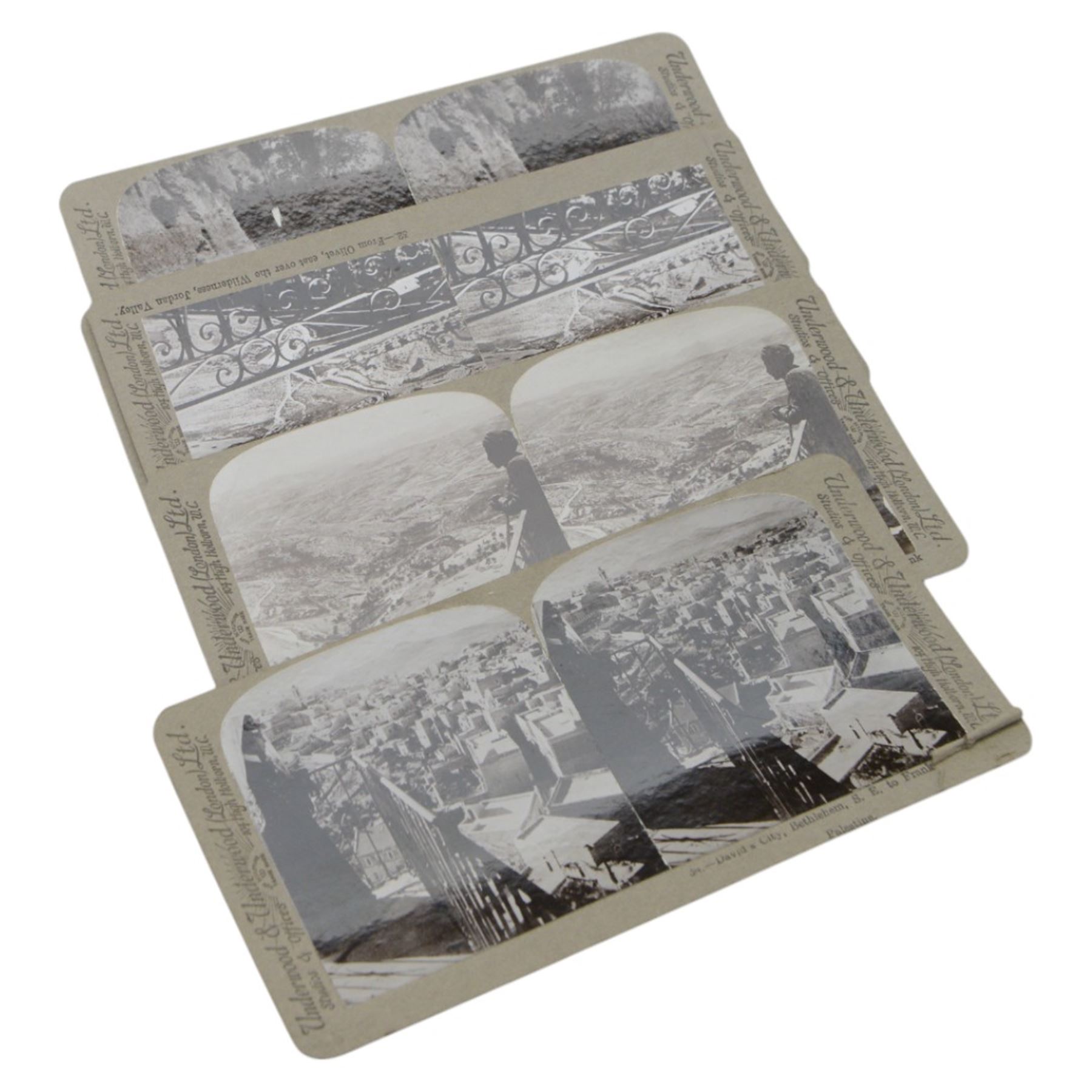 The Underwood Travel Library 'Palestine' stereoscope cards volumes I & II, together with an Underwood & Underwood stereoscope viewer