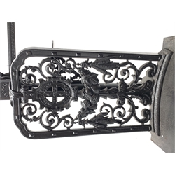 19th century platform scales by Parnall & Sons. Bristol, black painted cast iron, raised back decorated with foliage scrolls and fruit garland, H128cm