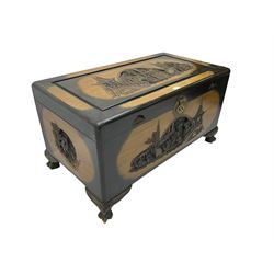 Singapore camphor wood blanket chest, rectangular hinged top with carved panel depicting traditional pagoda and river scenes