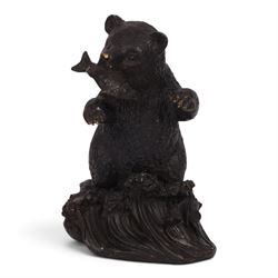 Bronze bear, upon a naturalistic base, with a fish in mouth, H17cm