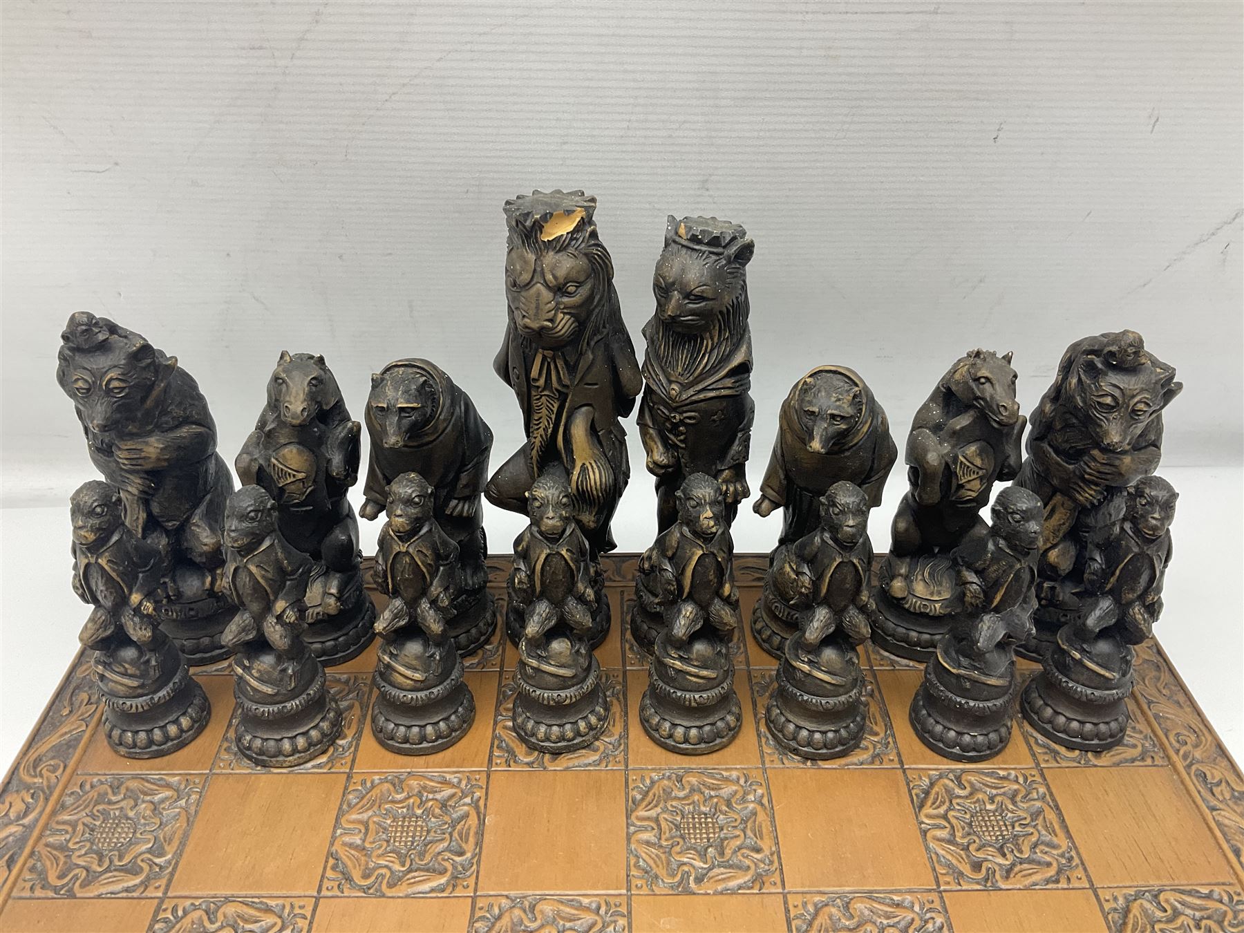 Chess set and resin chess pieces moulded as various animals, the pawns as monkeys, Kings as lions etc, board L46cm, W46cm, king H19cm