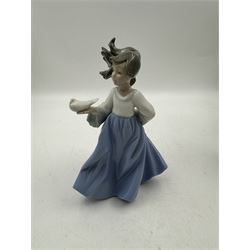 Four Lladro figures, including Angel Laying Down no 4541, Angel Pensando no 4539 etc, together with Nao figure 