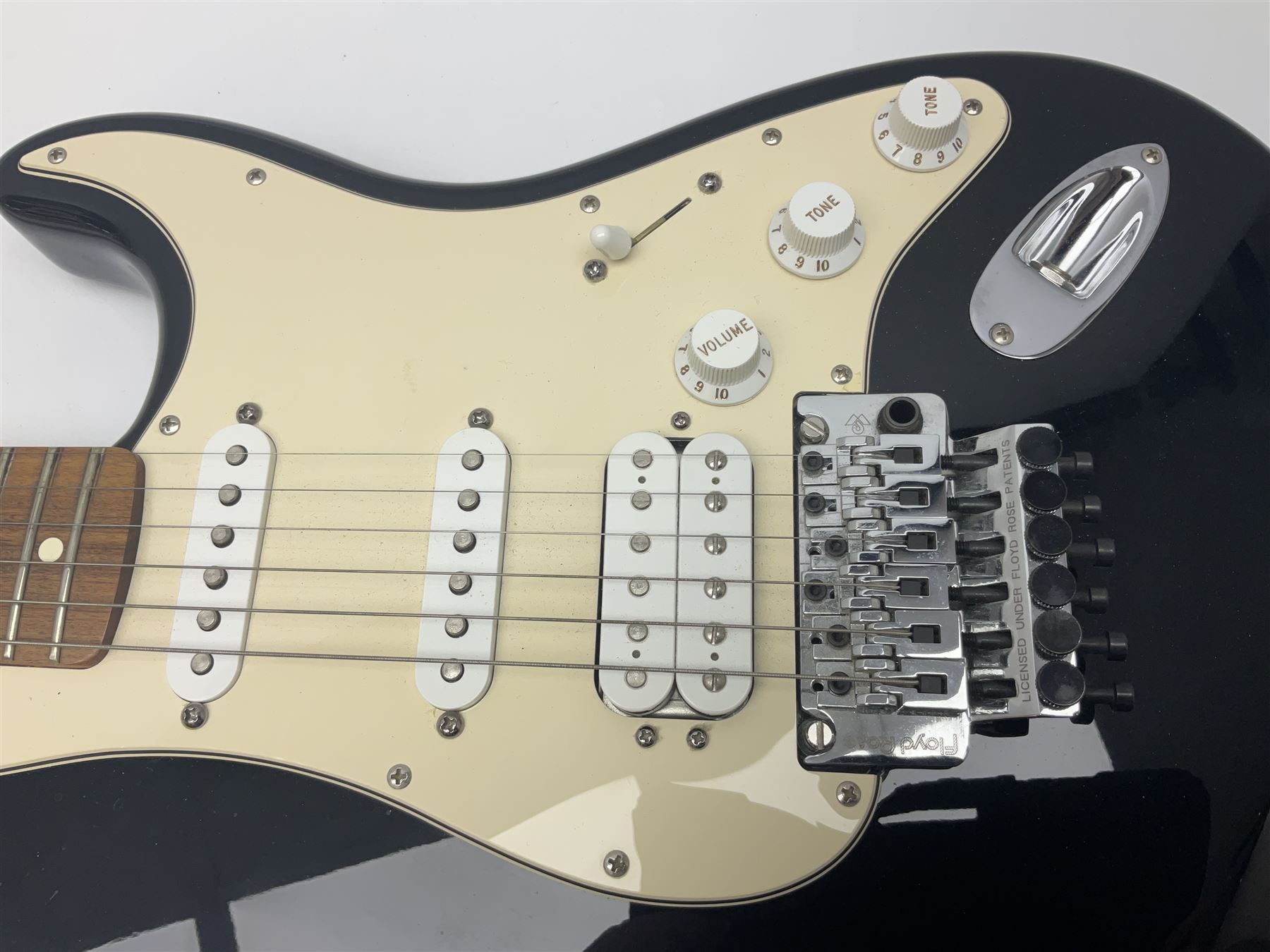 Mexican Fender Stratocaster electric guitar in black c2003 with Floyd Rose tremolo system, serial no.MZ3129600; L98cm; in Freestyle fitted case with 2006 Diamond Anniversary booklet