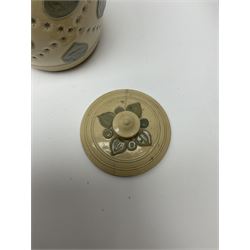 A group of Doulton Lambeth and Royal Doulton tobacco jars, to include examples with relief moulded foliate decoration, each with impressed marks and markers monograms beneath. 