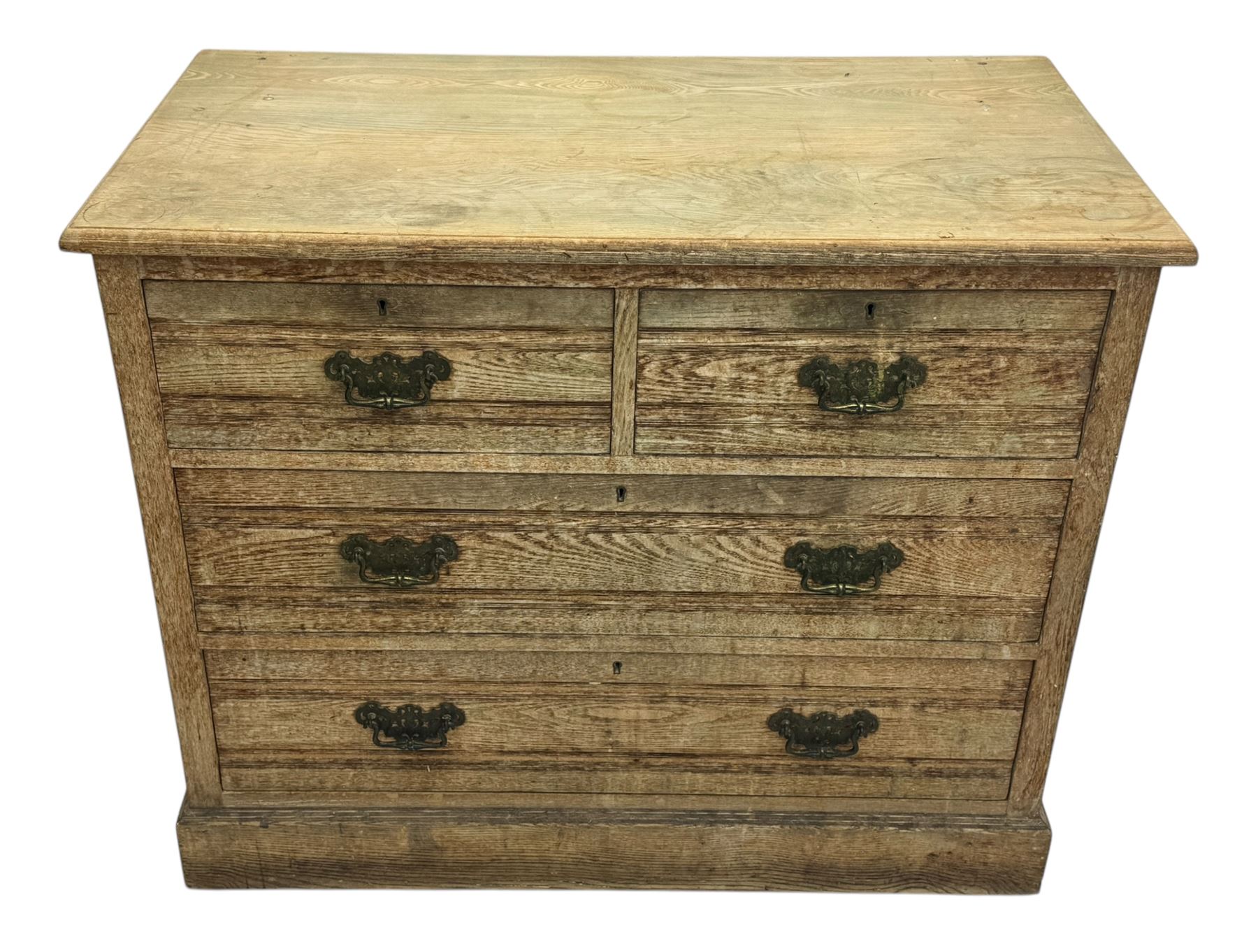 19th century oak chest of drawers, rectangular moulded top over two short and two long drawers, on plinth base (W99cm, D53cm, H81cm); early 20th century glazed mahogany display cabinet; Edwardian mahogany revolving bookcase (3)