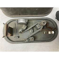 Cooke Troughton & Simms grey painted brass dumpy level in carrying case; and WW2 British .303 Vickers Machine Gun brass Clinometer, stamped 'V.E. 0067' serial No. 2370,  dated 1944 unboxed (2)