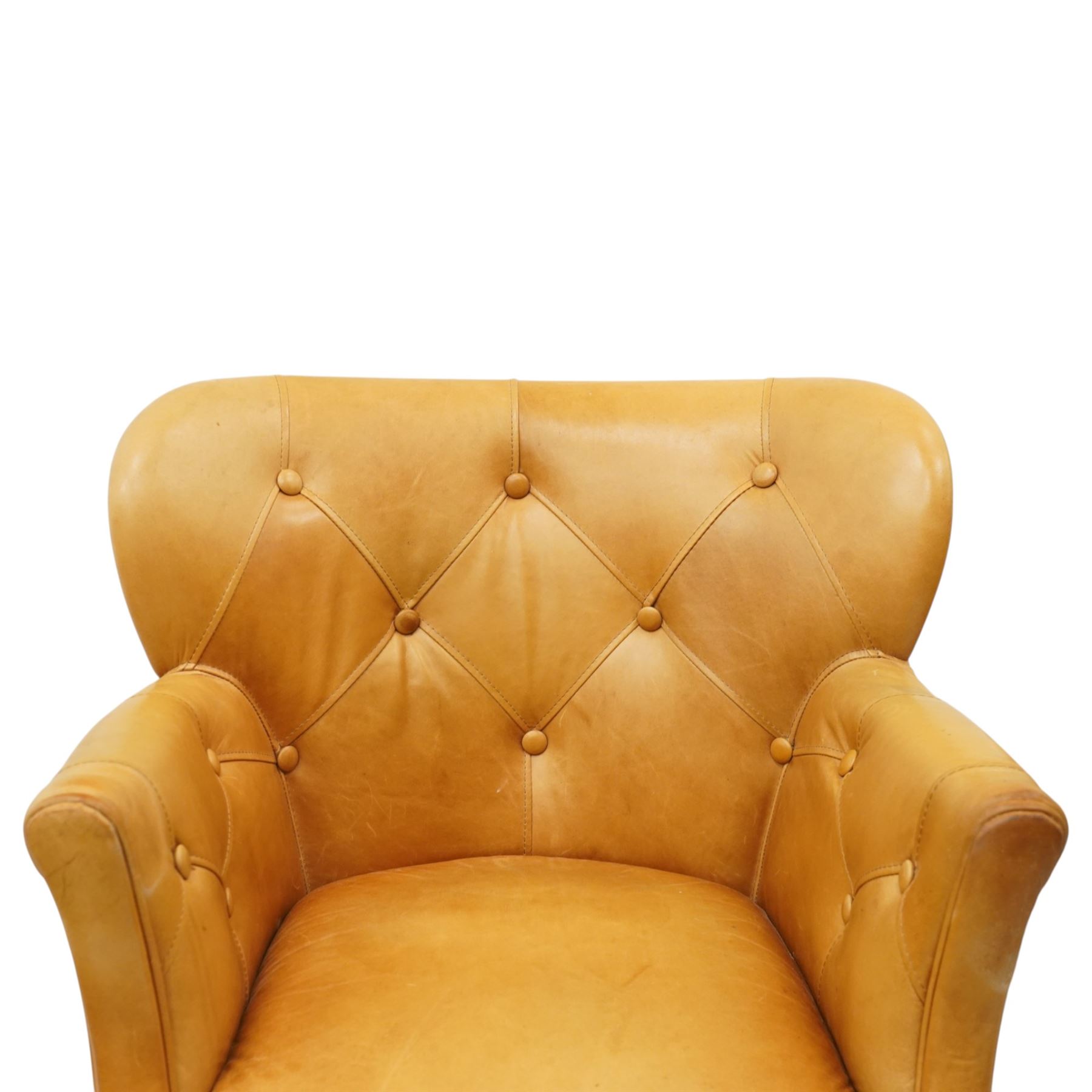 John Lewis - Pair of ochre leather tub chairs, downswept arms, button back and arms, raised on dark supports 
