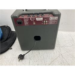 Richwood electric bass guitar in blue, cream and natural finish L117cm; in Fender soft carrying case; together with Behringer Thunderbird Bx108 amplifier date code 0 4 11.