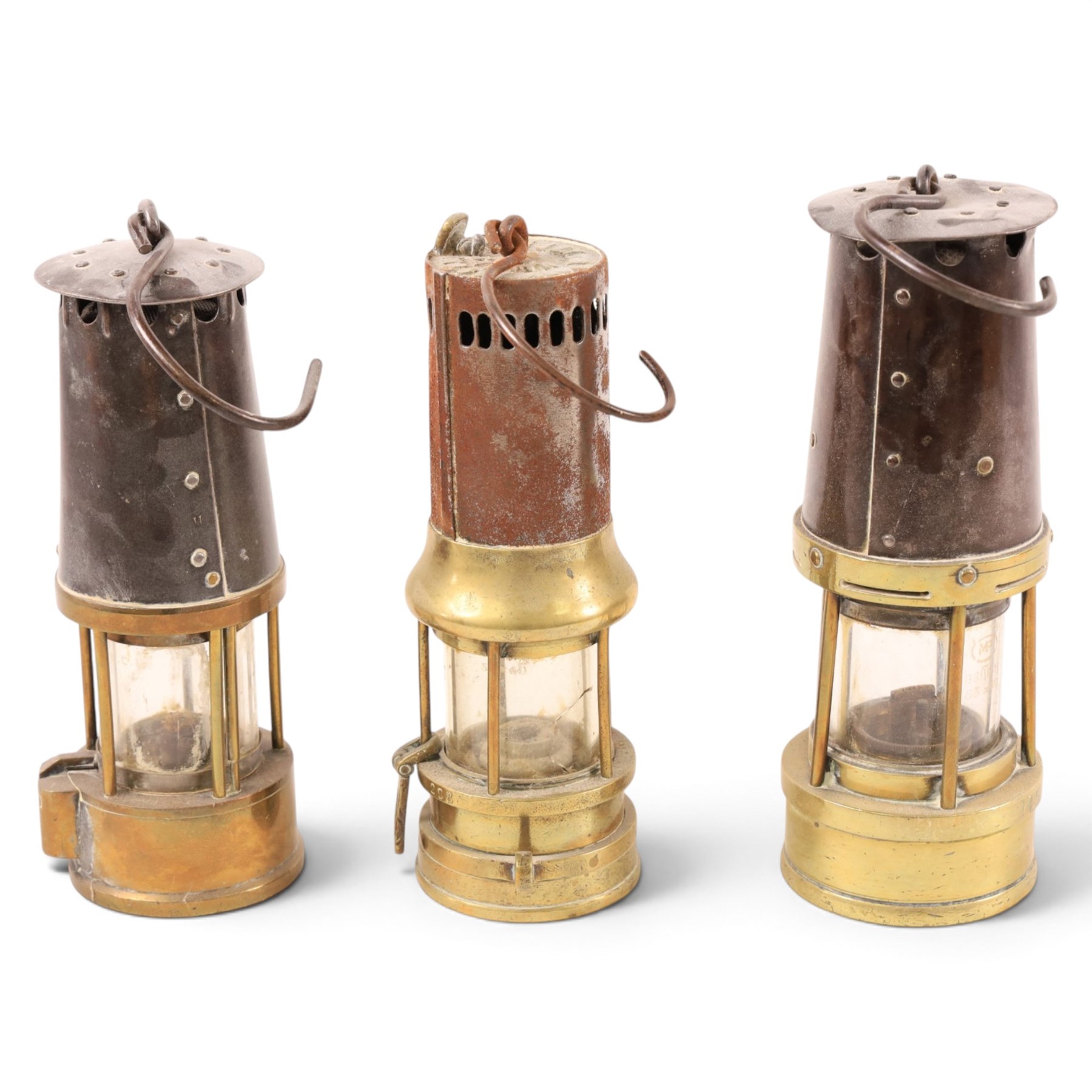 Three mining lamps, including John Davis & Son no. 2 B safety lamp, Protector Lamp & Lighting Co Type SL no. 29 lamp and one other