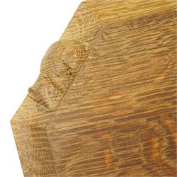 Mouseman - oak chopping board, of canted octagonal form, with carved mouse signature, by the workshop of Robert Thompson of Kilburn