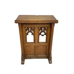 19th century oak ecclesiastical reading stand, panelled support with pierced arch design and chamfered uprights, on sledge feet