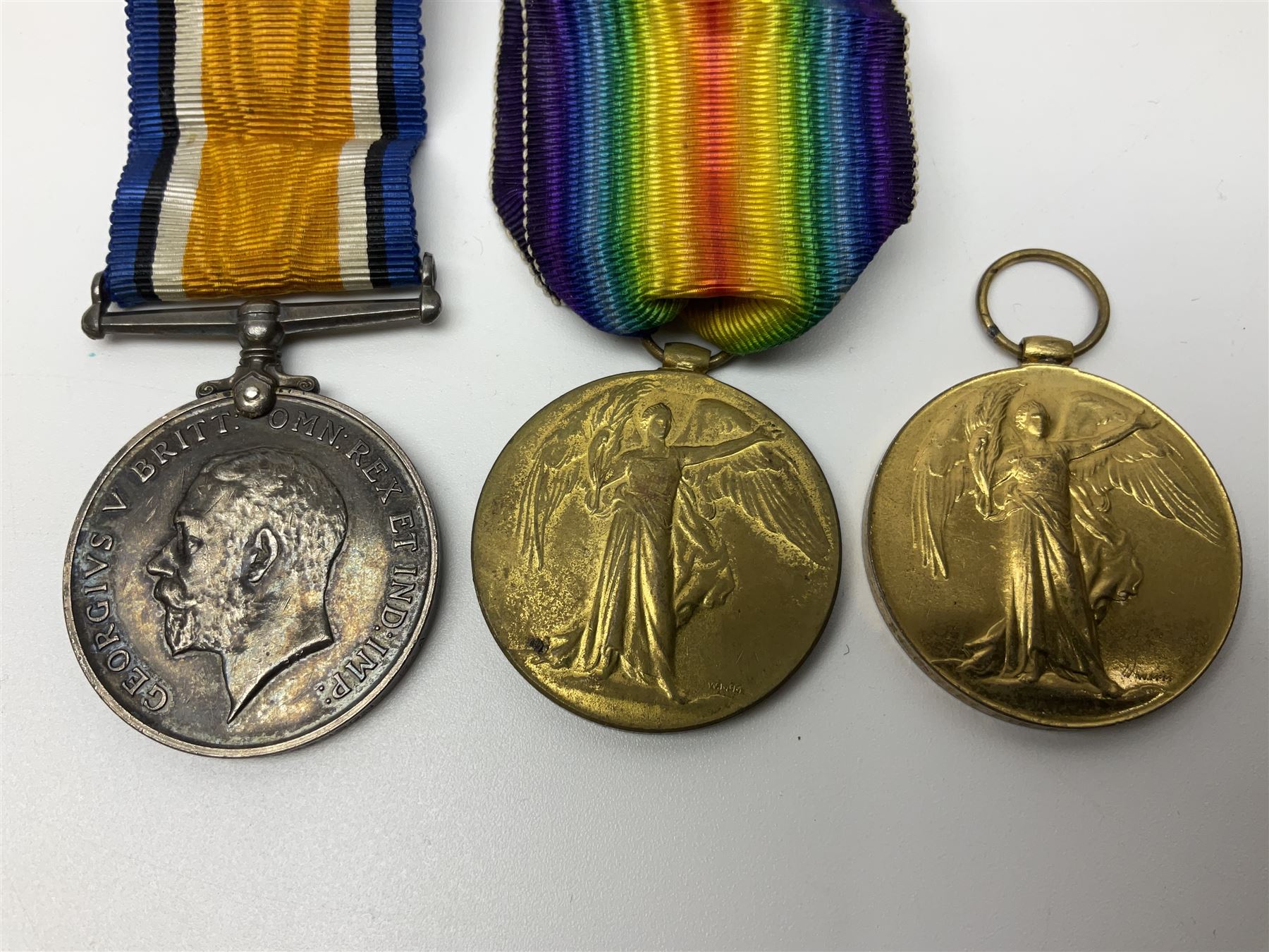 WW1 trio of medals comprising British War Medal, Victory Medal and 1914-15 Star awarded to S/4 091131 Pte. B.T. Day A.S.C.; and WW1 pair of medals comprising British War Medal and Victory Medal awarded to 240653 Gnr. E. Stephenson R.A.
