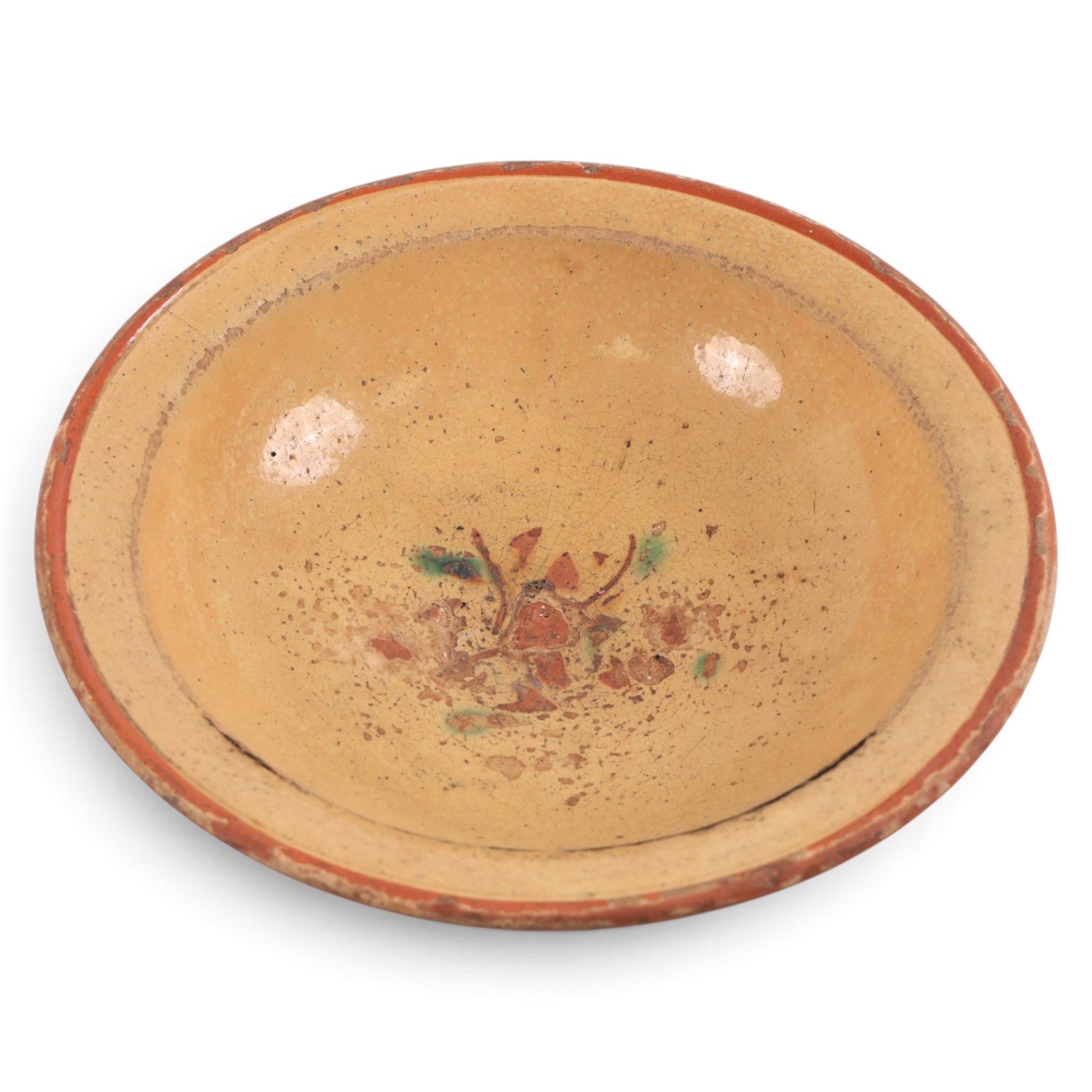 Spanish twin handled cooking pot, blackened to the outside, together with two bowls with slipware glaze, pot H22cm 