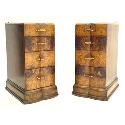 Pair Art Deco period figured walnut pedestal bedside lamp chests, shaped form with double bow front, each fitted with four graduating drawers with brass and bakelite handles, stepped and shaped plinth bases