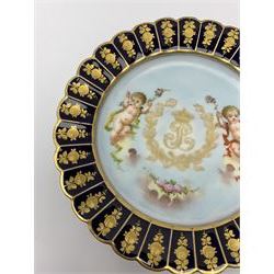 Mid 19th century Sevres Louis Philippe period porcelain cabinet plate, decorated with central Louis Philippe crowned monogram flanked by two cherubs, within cobalt gilt detailed border, with date mark for 1846, red inventory mark for Chateau des Tuileries, and blue monogram mark , D14.5cm