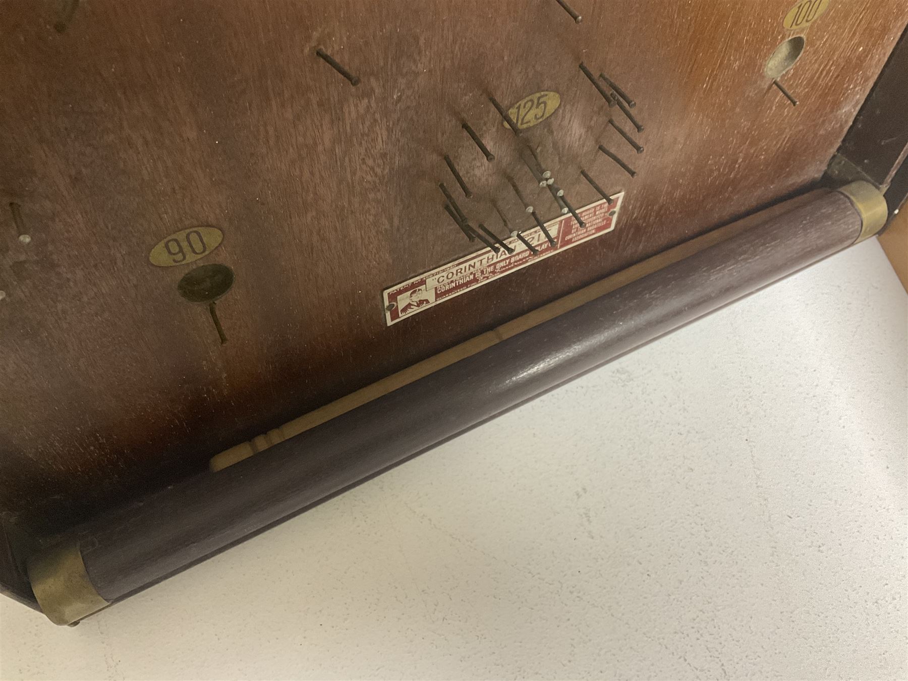 John Jaques and Son ‘Devil Among the Tailors’ wooden vintage skittles game, missing pole and ball, with instruction manual and original box; and a Corinthian Bagatelle board with marbles and push stick 