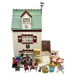 Scratch-built wooden doll's house as a white and green painted two-storey house with furniture H74cm, L40cm