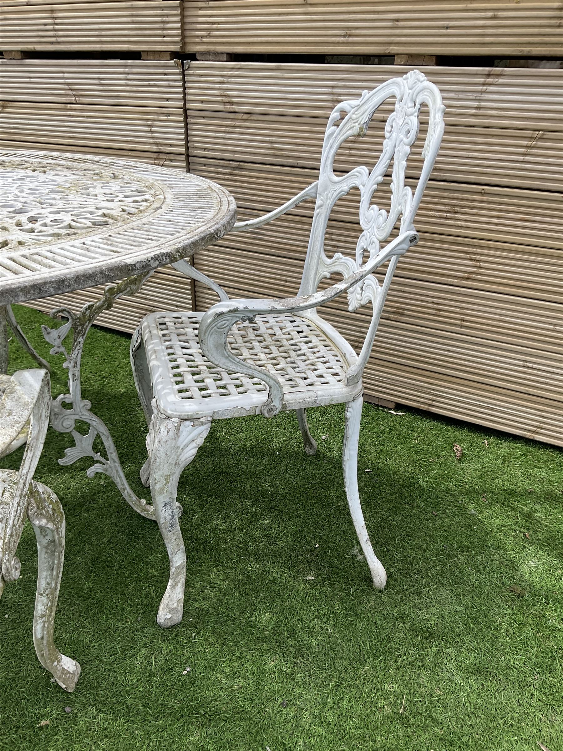 Victorian style cast aluminium white painted garden table and four chairs - THIS LOT IS TO BE COLLECTED BY APPOINTMENT FROM DUGGLEBY STORAGE, GREAT HILL, EASTFIELD, SCARBOROUGH, YO11 3TX