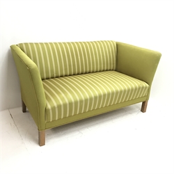 Mid century oak framed two seat settee upholstered in chartreuse striped fabric, square supports, W145cm 