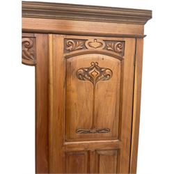 Edwardian walnut triple wardrobe, two drawers to base, carved Art Nouveau detail