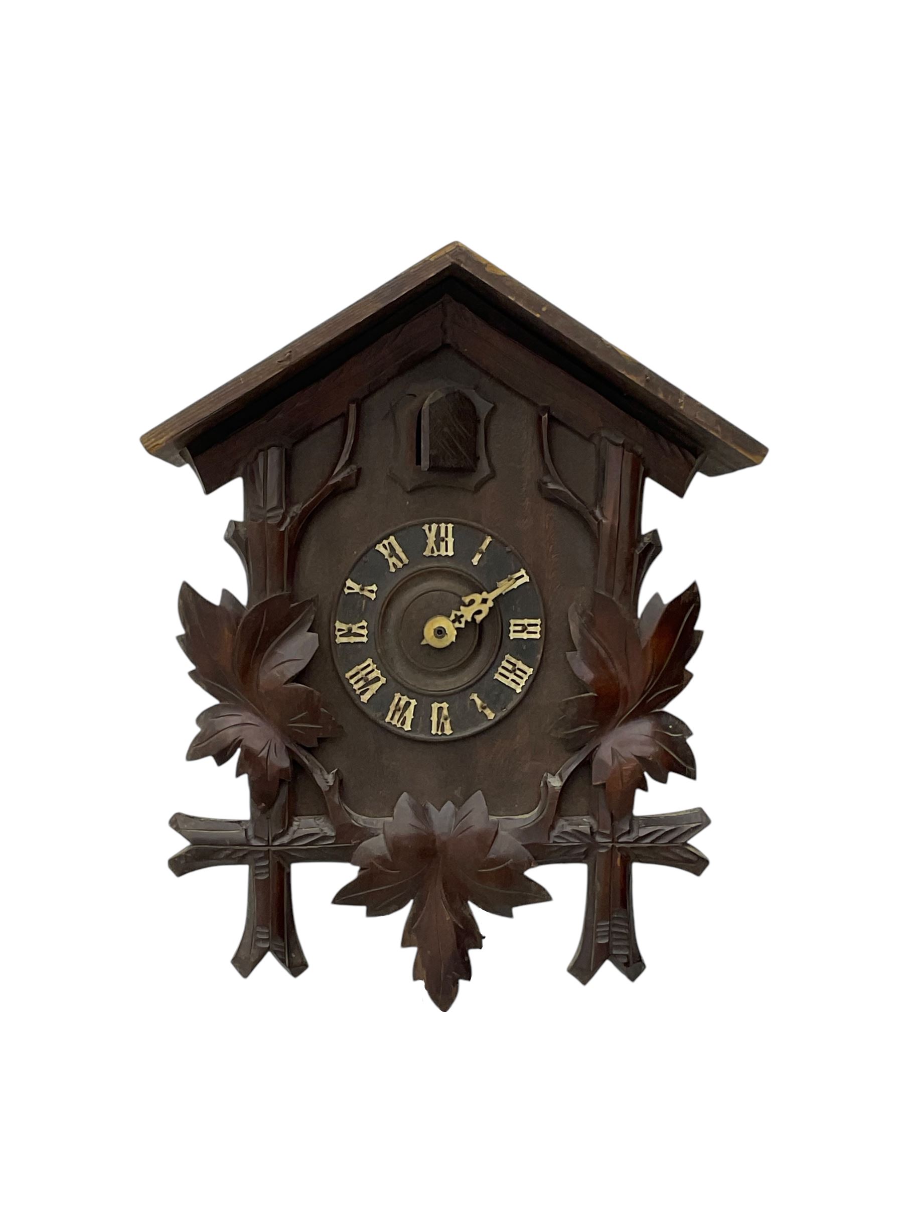 19th century child's rocking chair; heavily carved cuckoo clock; canal buckby can hand painted with floral motifs (3)