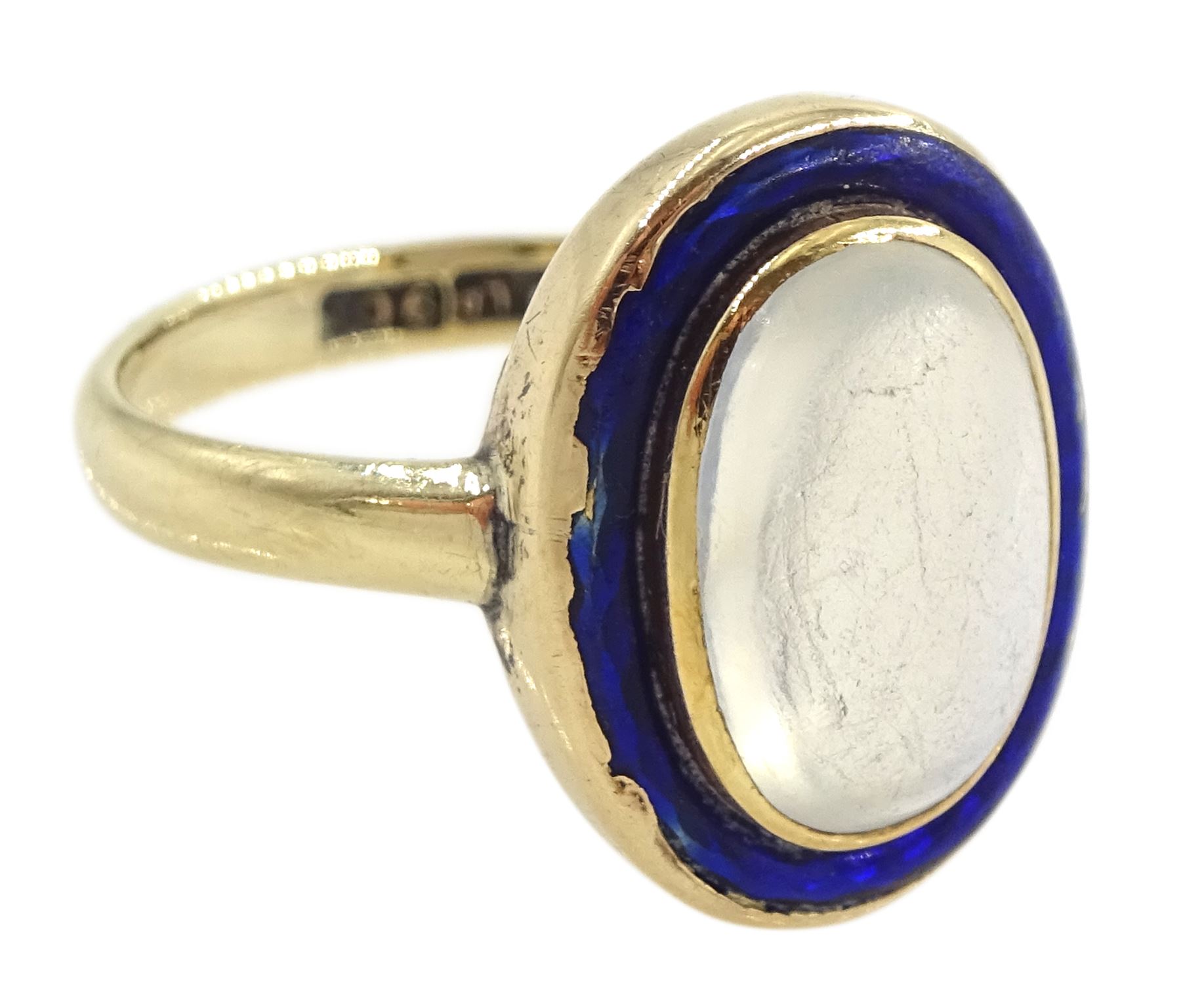 Early 20th century moonstone and blue enamel ring, stamped 9ct