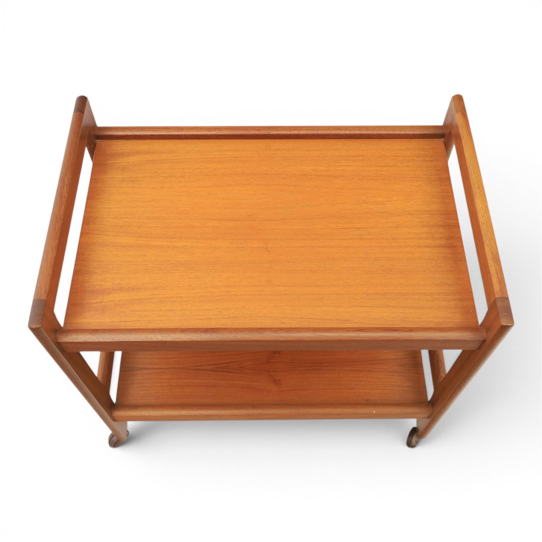 Brdr. Furno - teak tea trolley, two tiers with handles, raised on square supports on castors