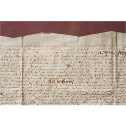 An Elizabeth 1 indenture in English secretary hand regarding the transfer of an estate in the parish of Middleton, 1566 document size 28cm x 42cm, framed 