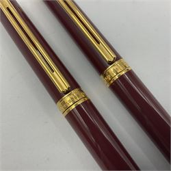 Montblanc Noblesse Oblige fountain pen, the maroon barrel and cap with gilt clip and mounts and nib stamped 585 14K/ct, together with a matching ballpoint pen, largest L14cm (2)