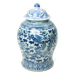 Large Chinese Temple Jar, of baluster form, the body painted with dragons among foliage, i...
