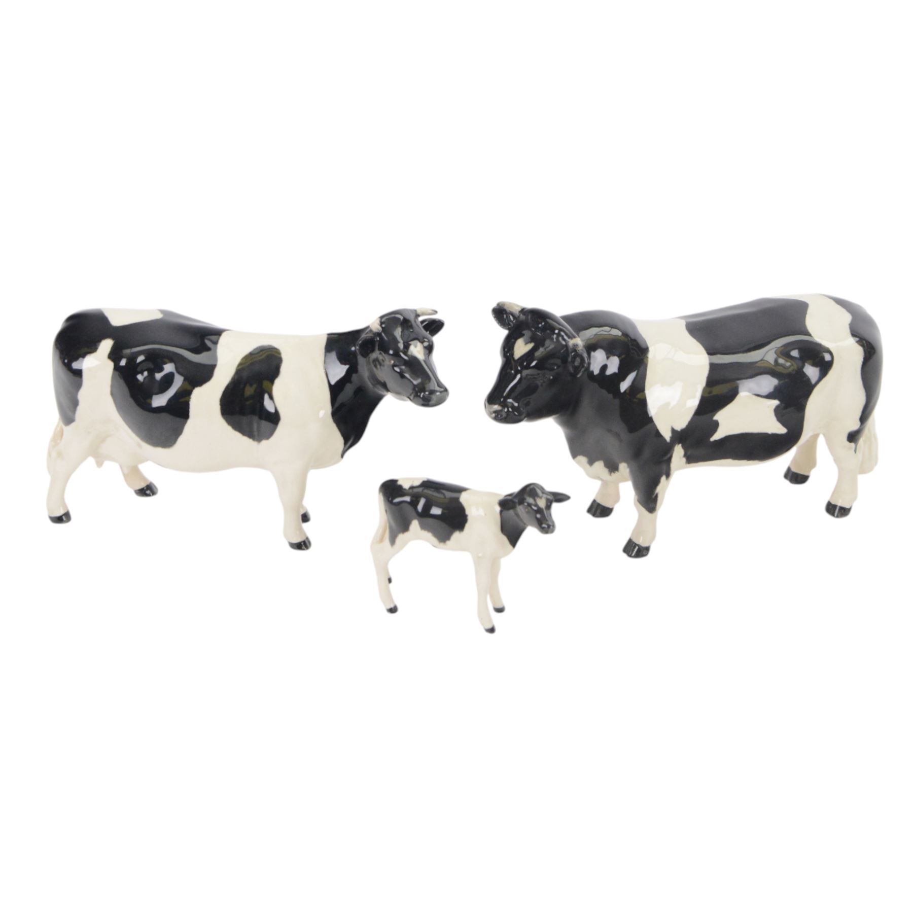 Beswick Friesian Cow family group, comprising Bull CH. Coddington Hilt Bar 1439, Cow CH. Claybury Leegwater 1362 and Calf 1249