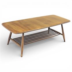 Ercol - Dark elm coffee table, plank top with chamfered edges, over a central under tier s...