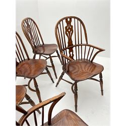 Set of six 20th century distressed elm Windsor chairs, comprising two carvers and four side chairs