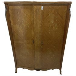 Mid-20th century French Kingwood double wardrobe, shaped front, enclosed by two doors inlaid with flowers, fitted with two drawers and shelves, shaped apron with splayed feet, decorated with ornate cast metal mounts 