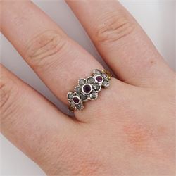 19th century 14ct gold and silver ruby and rose cut diamond flower head cluster ring, with foliate design shoulders