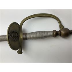 19th century continental courtsword, with plain 77.5cm double-edged steel blade, silvered brass hilt with knucklebow and ornate shell guard with central crowned crest stamped on reverse P.T.A.; in metal mounted leather scabbard L93cm overall; and another continental courtsword with double fullered blade and brass hinged shell guard applied with a medical badge; lacking scabbard (2)