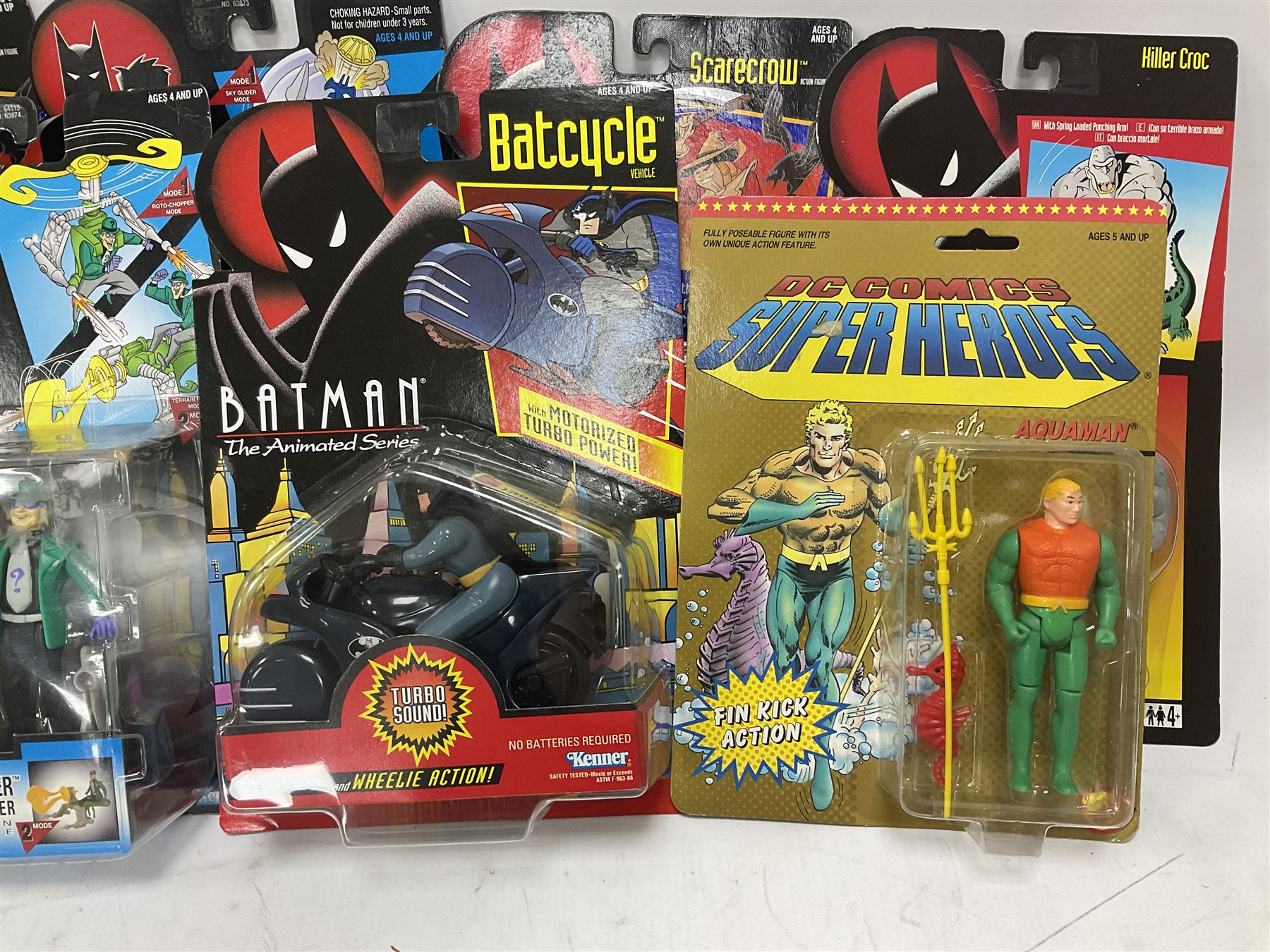 Twenty-four carded action figures of Batman (11) and other Super Heroes including Spiderman, DC Universe, Xyber 9 etc; all in unopened blister packs (24)