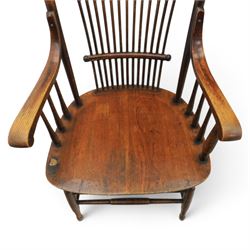 Set of three 19th century ash and elm spindle back Windsor armchairs, arched top rails above fan-shaped spindle backs, curved arms with turned supports, shaped saddle seats, on turned legs joined by H-stretchers