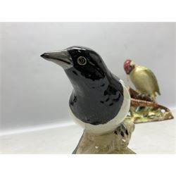 Three Beswick figures of birds, comprising pheasant no 1225, magpie no 2305 and woodpecker 1218, all with impressed marks beneath, tallest H22cm