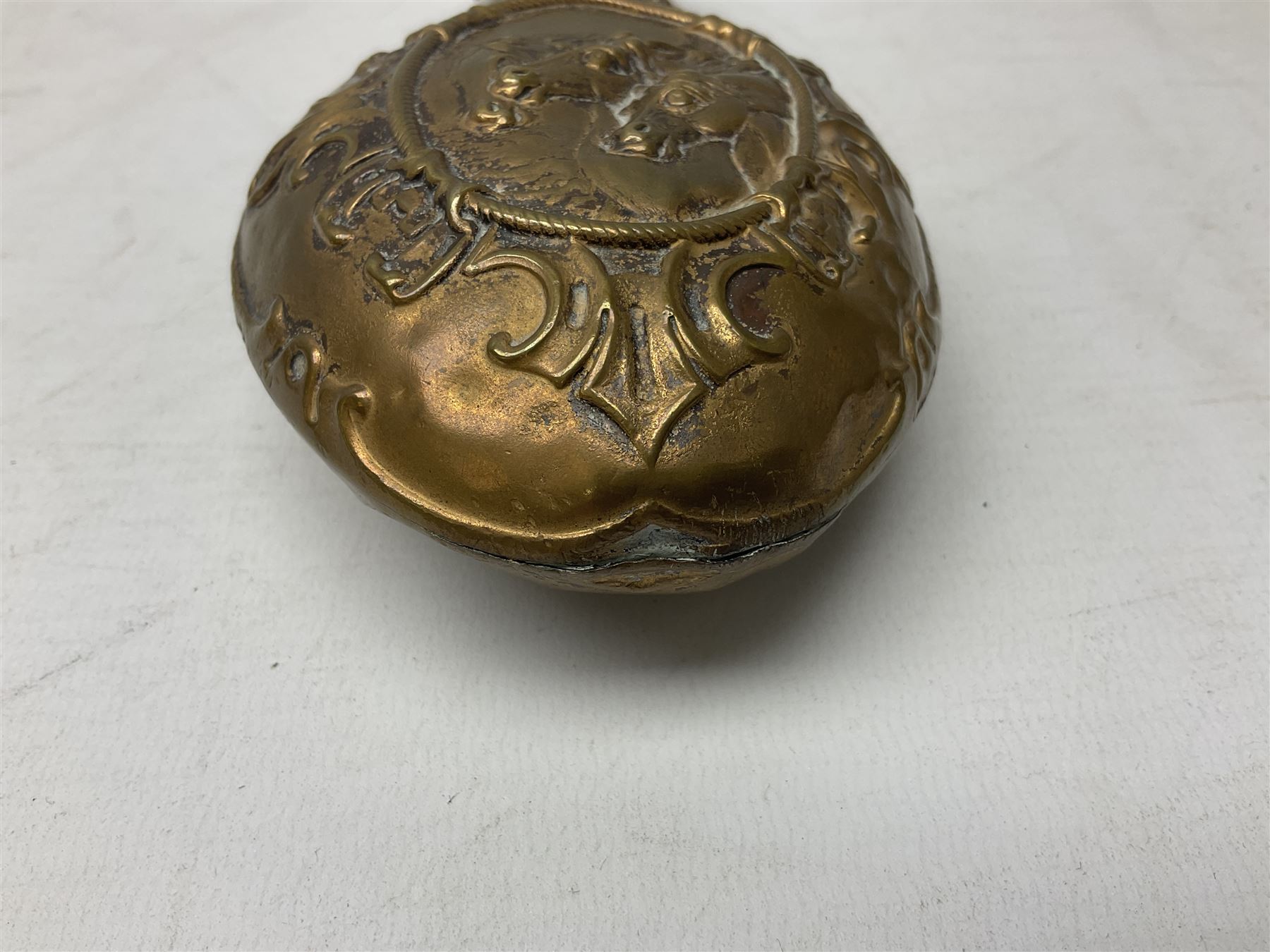 Copper and brass powder flask by G. & J.W. Hawksley Sheffield with embossed panel of 'Pharaohs Horses' to one side H21cm