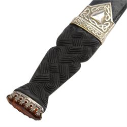 Skean dhu, the 9cm blade with scalloped back edge, with ebonised hilt and stone pommel, in its leather covered sheath with silver collar, hallmarked 1955