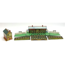 Hornby '0' gauge - three-piece Margate Station fitted with electric lighting, tin printed building and green platforms; signal cabin; and three-piece girder bridge, all unboxed (3)