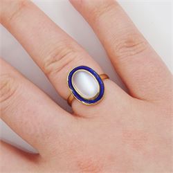 Early 20th century moonstone and blue enamel ring, stamped 9ct