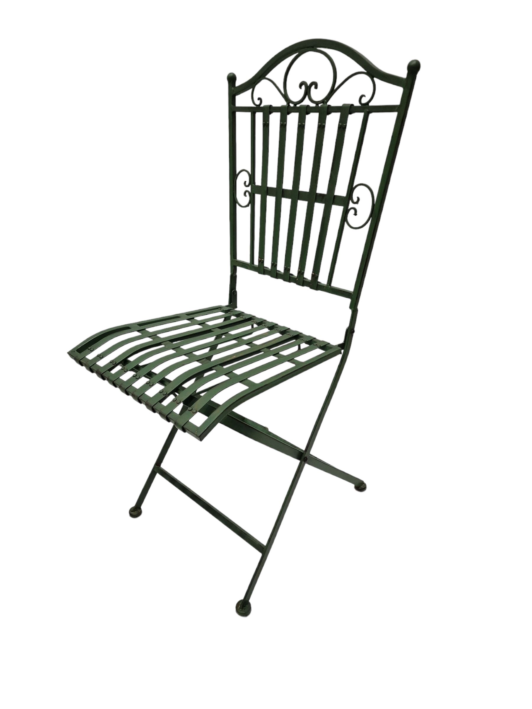 Wrought metal slatted round folding garden table and four chairs in green finish - THIS LOT IS TO BE COLLECTED BY APPOINTMENT FROM DUGGLEBY STORAGE, GREAT HILL, EASTFIELD, SCARBOROUGH, YO11 3TX