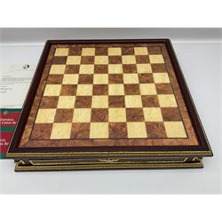 Franklin Mint House of Faberge 'The Imperial Jewelled Chess Set', to include set of chess pieces with malachite finish and a set with carnelian finish and a hardwood chess board
