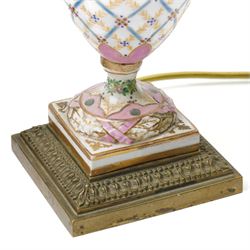Pair of Sevres style table lamps, with pink and gilt floral decoration, apocryphal marks to bases, H32cm (2)