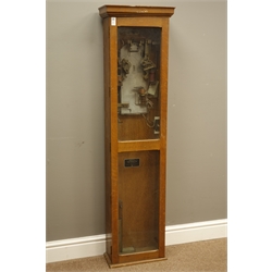  Magneta Time Co Ltd electric master clock, model no.36, serial no. 7233, in oak case with glazed door, minus dial, H141cm  
